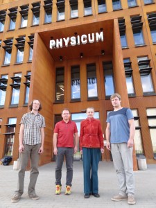 The authors in front of the building of the Institute of Physics, University of Tartu, Estonia: doctoral students Mihkel Rünkla (far left), Ott Vilson (far right), senior researcher Margus Saal (center left), head of the Laboratory of Theoretical Physics Piret Kuusk (center right).