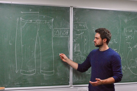 One of the authors, Ian Jubb, discussing a pair of trousers with his colleagues at Imperial College London. Ian Jubb is currently the PhD student of Fay Dowker at Imperial College London.